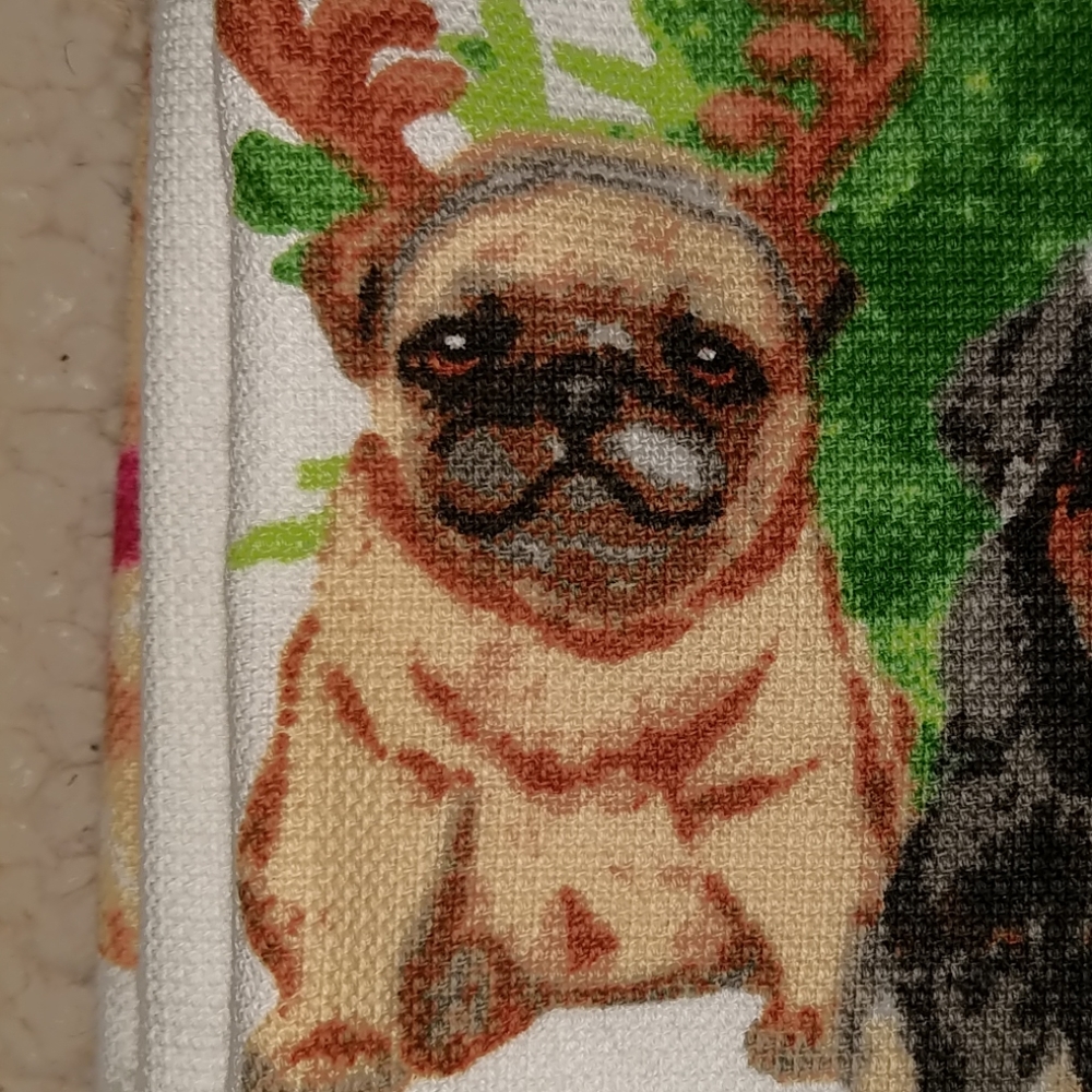 Pug and Friends Christmas dish towels set up to